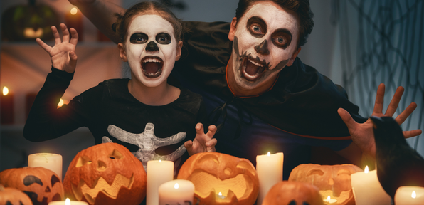 Dad and daughter enjoying Halloween|Toffee Apples|Children wearing Halloween costumes|Halloween toilet roll characters|Pumpkin Carving